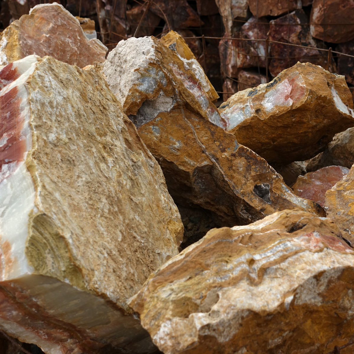 Brown red mexican onyx boulders