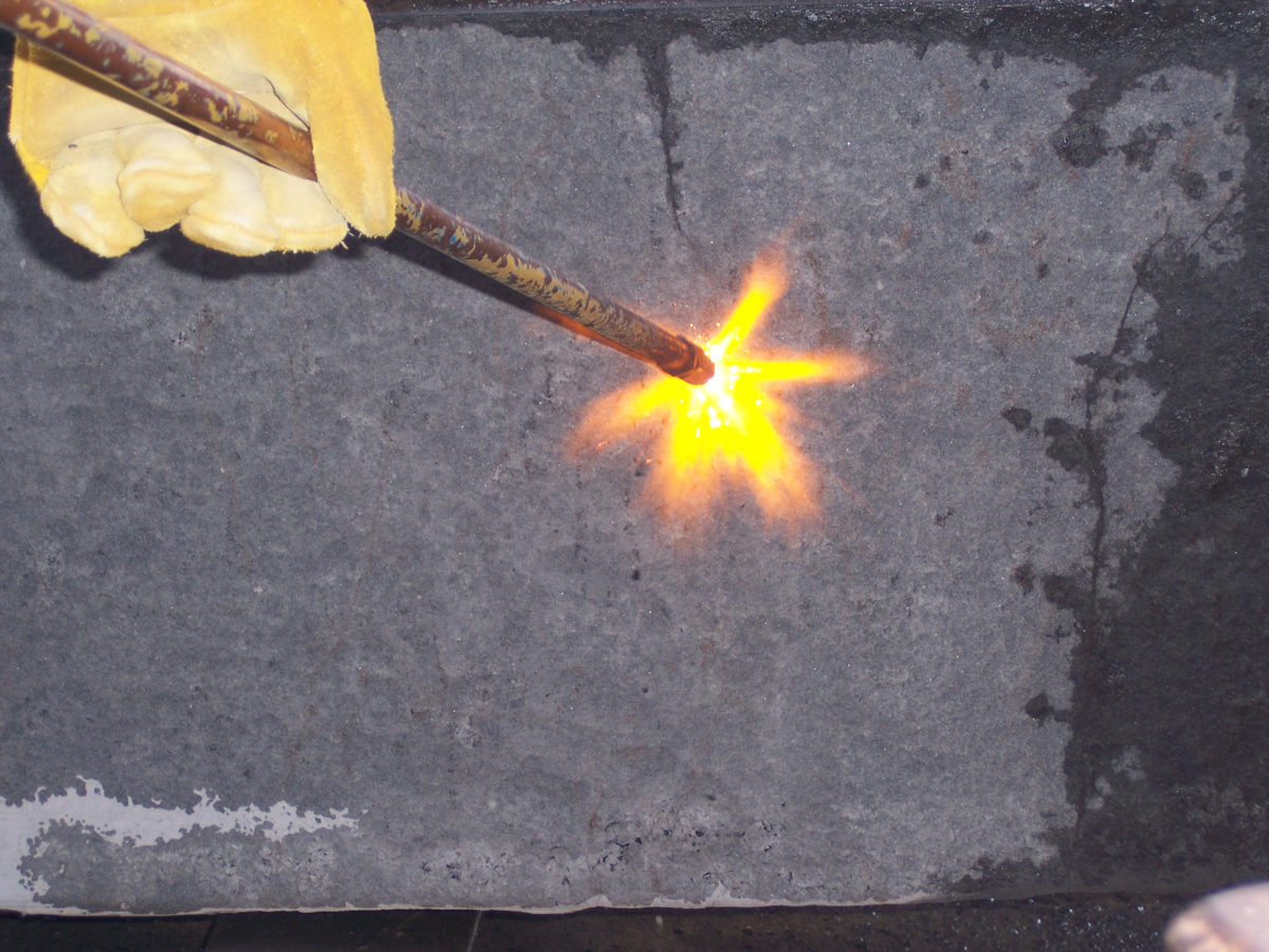 Custom stone flaming process